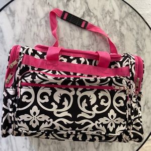 Pink black and white travel duffle bag